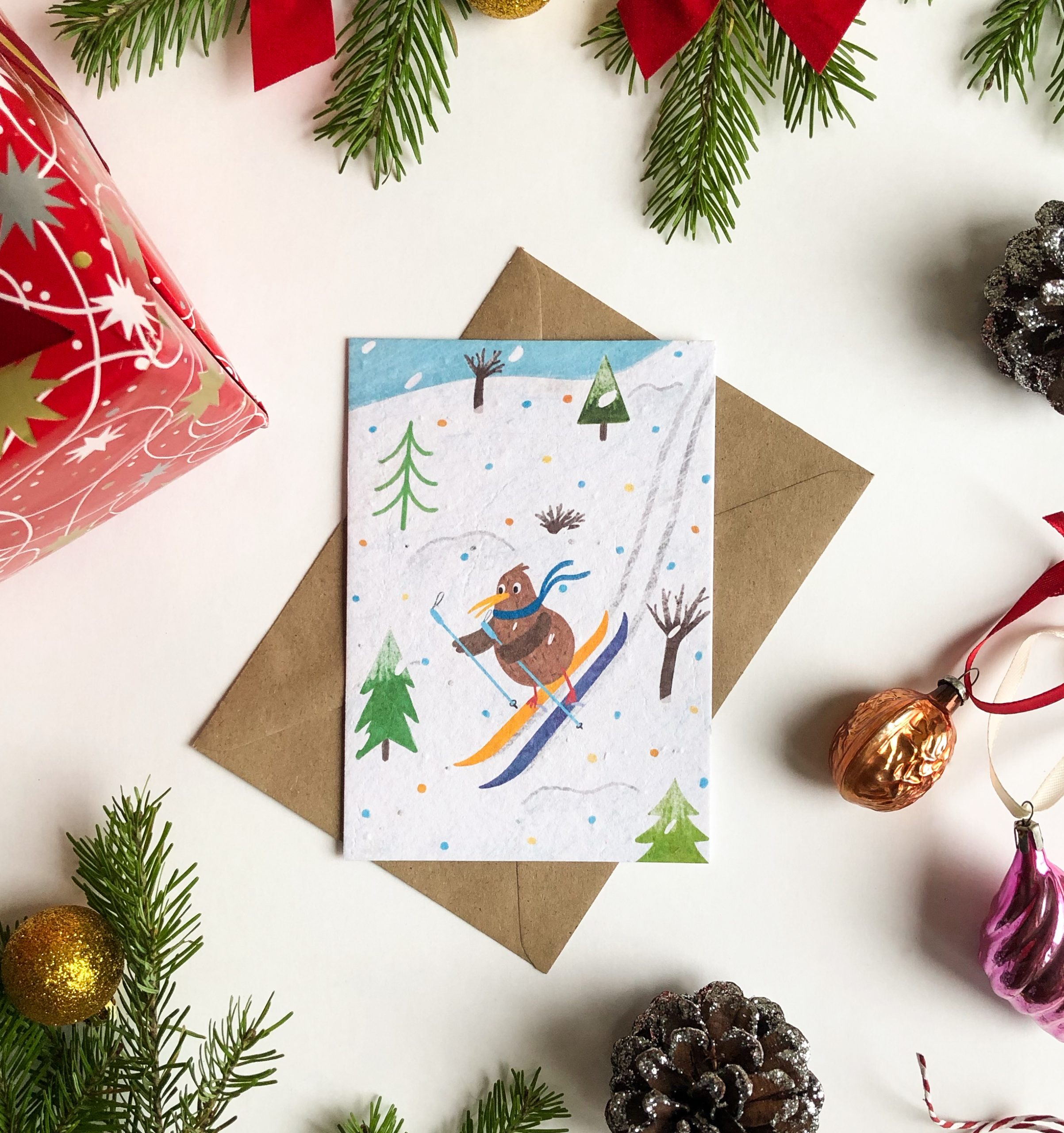 Новогодняя открытка с птицей киви, из которой вырастут васильки - подарки на новый год